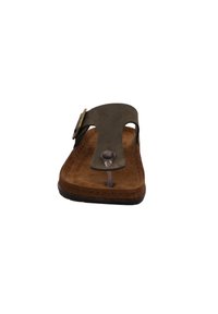 Brown leather thong sandal with a smooth upper, a circular metallic accent, and a textured, brown insole. Flat sole design.