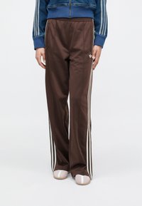 adidas Originals FIREBIRD LOOSE - Donji dijelovi trenirke - auburn/cream white