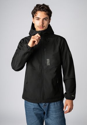 Zwarte hoodie met ritssluiting, zijzakken en tekst "URBAN EDITION"; gemaakt van glad, duurzaam materiaal met een slim-fit ontwerp.