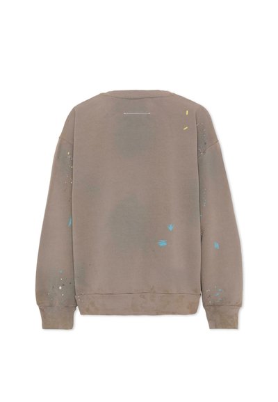 Felpa color taupe con maniche lunghe, polsini e orlo a coste, caratterizzata da piccole macchie di vernice gialle, blu e bianche.