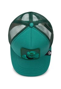 Teal trucker hat with a solid front panel, mesh back, and round button. Features a patch with a graphic design. Adjusts at the back.