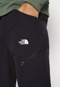The North Face Ulkohousut - black