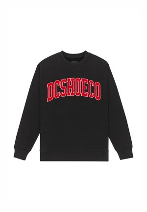 Sweatshirt noir avec un grand lettrage "DCSHOECO" rouge en design courbe. Fabriqué en tissu doux avec des poignets et un ourlet côtelés.