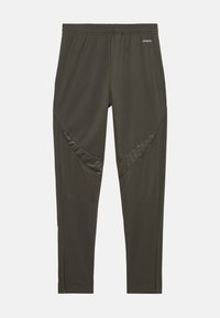 Leggings de sport en vert olive foncé, fabriqués en tissu texturé avec des accents brillants, dotés d'une jambe fuselée et de poignets zippés.