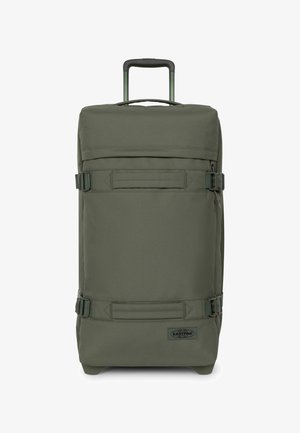 Valigia da viaggio color kaki con manico estraibile, due cinghie laterali, forma rettangolare e tessuto in stoffa. Presenta un logo sulla parte frontale.