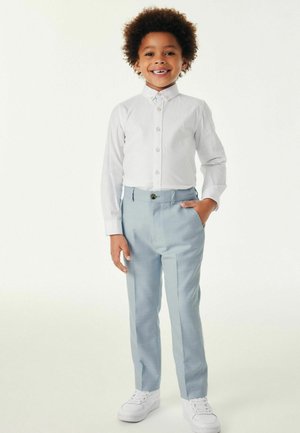 STANDARD - Nohavice chinos - light blue