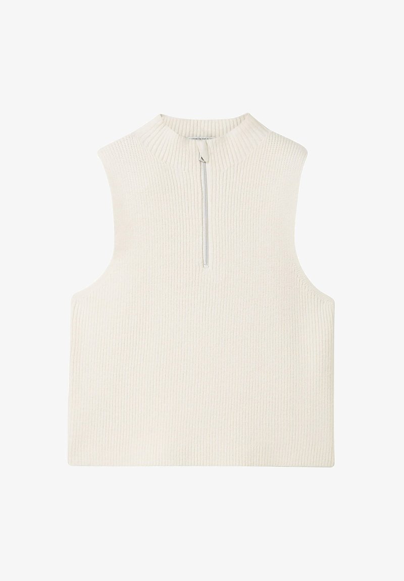 Bez rękawów, kremowy top dzianinowy o prążkowanej fakturze i pół-zamkiem z przodu. Posiada wysoki kołnierz i prostokątny krój.