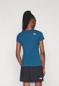 The North Face W SS SD SLIM TEE - T-shirt basic - midnight petrol