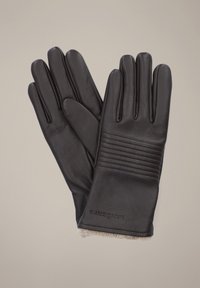 Czarne skórzane rękawiczki o gładkiej fakturze, z żebrowanym wykończeniem z tyłu i miękkim, jasnym mankietem.