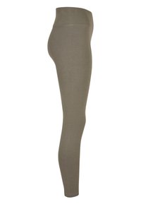 Olijfgroene leggings van zachte, rekbare stof, met een hoge tailleband en een slank, aansluitend ontwerp.