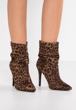 Bottines à talons hauts - stone