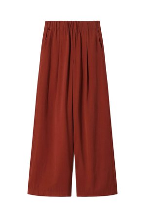 Wijd uitlopende broek in roestkleur met een elastische tailleband en zijzakken, gemaakt van lichtgewicht stof.