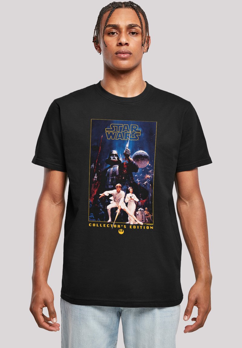 Svart bomull T-skjorte med et "Star Wars" grafikktrykk som viser karakterer, en livlig bakgrunn og gyldne bokstaver som leser "Collector's Edition."