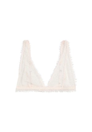 Genomskinlig vit spets-bh med tunna band, prydd med känsliga blommönster och fransade kanter på en enfärgad bakgrund.