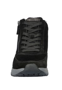Black suede sneaker with laces and a side zipper, featuring a textured gray rubber sole and contrasting mesh lining.