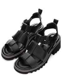 Černé kožené sandály na platformě s tlustými překříženými pásky, přezkou na zapínání a vroubkovanými pryžovými podrážkami, velikost 4½.