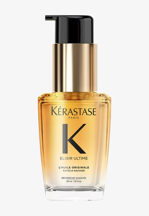 Kérastase Elixir Ultime haarolie in een doorzichtige 30 ml fles met gouden vloeistof en een zwarte pompspuit.