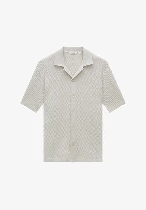 Lyhythihainen neulepaita vaaleassa beigessä, jossa on tekstuuri, viistottu kaulus ja etupainike, jossa on kahdeksan nappia.