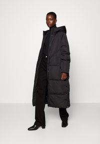 YAS Tall YASIRIMA LONG COAT - Piumino lungo - black