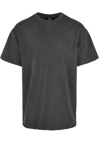 Grå kortärmad T-shirt med rundad halsringning, tillverkad av mjukt bomullsmaterial. Har en avslappnad passform och rak fåll.