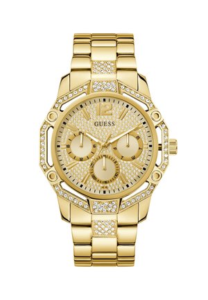 Montre en acier inoxydable doré avec un cadran texturé et étincelant, trois sous-cadrans, et des accents en cristal sur la lunette et le bracelet. Boîtier de forme octagonale.