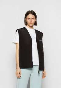 iets frans... REVERSIBLE QUILTED GILET - Colete - black
