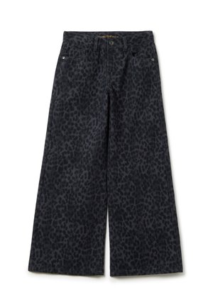 Pantalons larges noirs présentant un motif subtil de léopard. Fabriqués en tissu doux avec un design classique à 5 poches et une fermeture éclair.