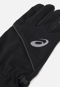 Black gloves made from stretchy material, featuring a silver logo, elastic cuff, and textured grip on fingers for enhanced functionality.