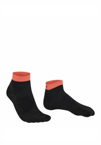 Czarne skarpetki sięgające kostek z koralowymi ribbami, wzmocnioną podeszwą i teksturowanymi wzorami po bokach. Zawierają detal logotypu w jasnym koralowym kolorze.
