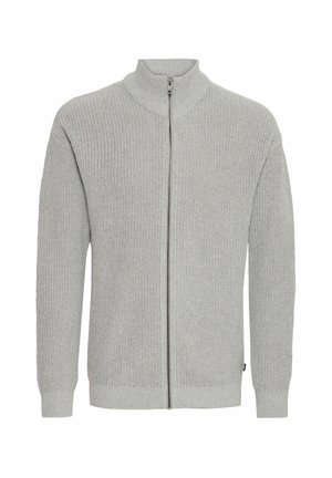 Pilkas zip-up džemperis su aukštu apykakle, raukšlėtu paviršiumi, ilgomis rankovėmis ir tiesius kirpimu. Yra priekis su užtrauktuku ir megztas audinys.