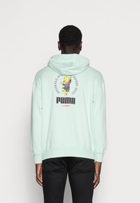 Puma PUMA HARIBO HOODIE - Felpa - gossamer green