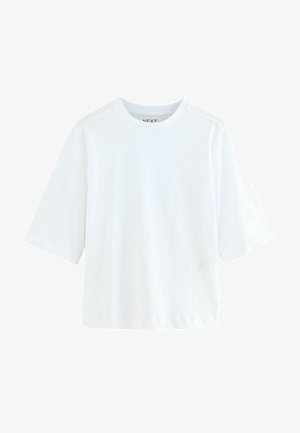 Valkoinen lyhythihainen t-paita, joka on valmistettu puuvillasta ja jossa on pyöreä pääntie. Ominaisuuksia yksinkertainen muotoilu ja rento istuvuus. Ei näkyviä kuvioita tai yksityiskohtia.