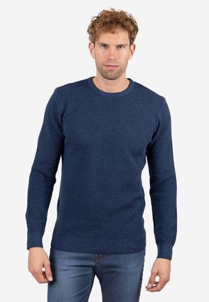 Suéter de punto azul marino con cuello redondo, mangas largas y patrón texturizado. Diseño ajustado con dobladillo y puños acanalados.