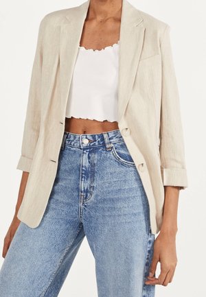 Halflange jas - beige