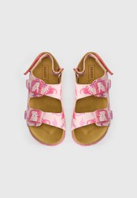 Sandali rosa con doppie cinghie regolabili, caratterizzati da un motivo di dinosauri giocosi. Realizzati in materiale sintetico con una soletta simile alla pelle scamosciata.