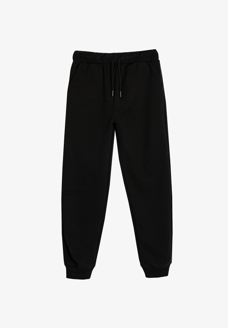 Zwarte joggingsbroek gemaakt van zachte stof, met een elastische tailleband met koord, zijzakken en taps toelopende boorden.