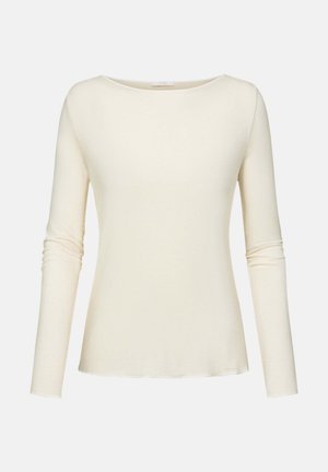 Haut à manches longues en blanc cassé, avec un décolleté scoop, des manches ajustées avec un léger froncé, et une texture douce et lisse.