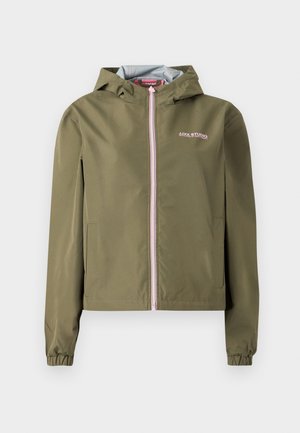 Olive green hooded jacket with light pink zipper, elastic cuffs, two side pockets, and "JJXX STUDIO" logo on chest.