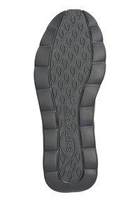 Svart gummisul med strukturerade vågiga mönster, med upphöjda triangulära sektioner för grepp och varumärket "ENERGYSTEP" präglat.