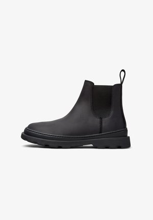 Schwarze Leder-Chelsea-Stiefel mit elastischen Seitenteilen, strukturierter Oberfläche, runder Zehenform und dicker Gummisohle. Mit einem Zugtab hinten.