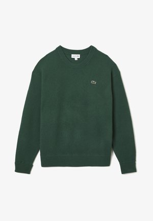 Pull col rond vert foncé à manches longues avec petit logo crocodile Lacoste brodé sur le côté gauche de la poitrine.
