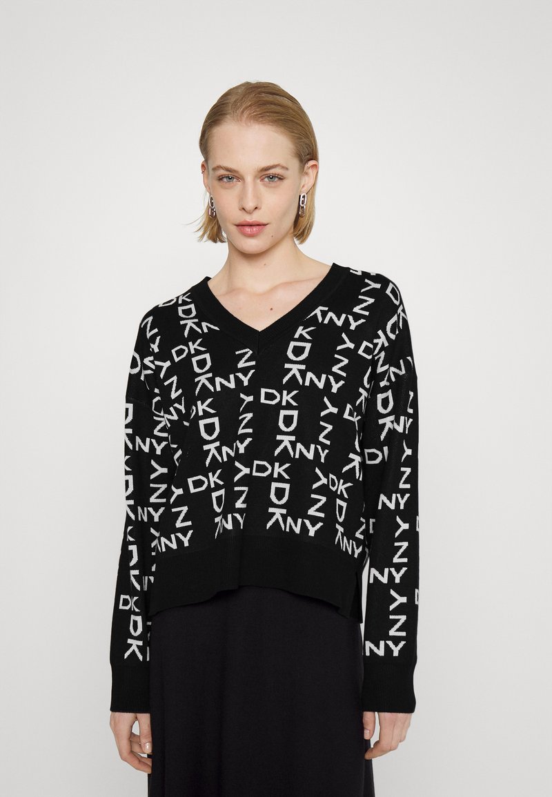dkny-neck-exploded-logo-sweater-neule-black-ivory-musta-zalando-fi