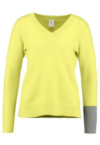 Klar gul V-ringad tröja med långa ärmar, med en grå detalj på ena ärmen och ribbat avslut. Mjuk textur och avslappnad design.