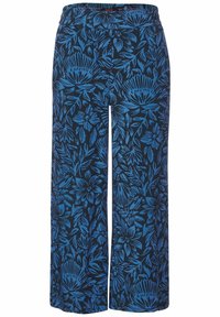 Pantalons larges en tissu bleu foncé arborant un motif floral audacieux dans diverses nuances de bleu. Taille élastique pour plus de confort.