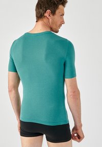 Damart COL V THERMOLACTYL SENSITIVE MANCHES COURTES - Caraco - vert