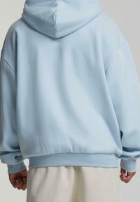 Karl Kani Jersey con capucha - light blue