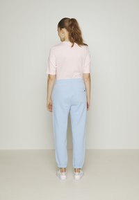 Lacoste Calças de fato de treino - bleu