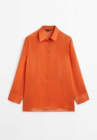 Chemise orange à manches longues avec boutons et col, présentée à plat sur fond blanc.