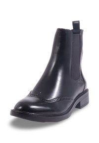 Bottine en cuir noir avec un bout arrondi, des panneaux élastiques sur les côtés, des détails de brogue décoratifs et un petit talon carré.