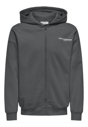 Felpa grigia con zip, realizzata in tessuto morbido, con zip frontale e cappuccio. Include testo bianco "LES CLASSIQUES" nella zona del petto.